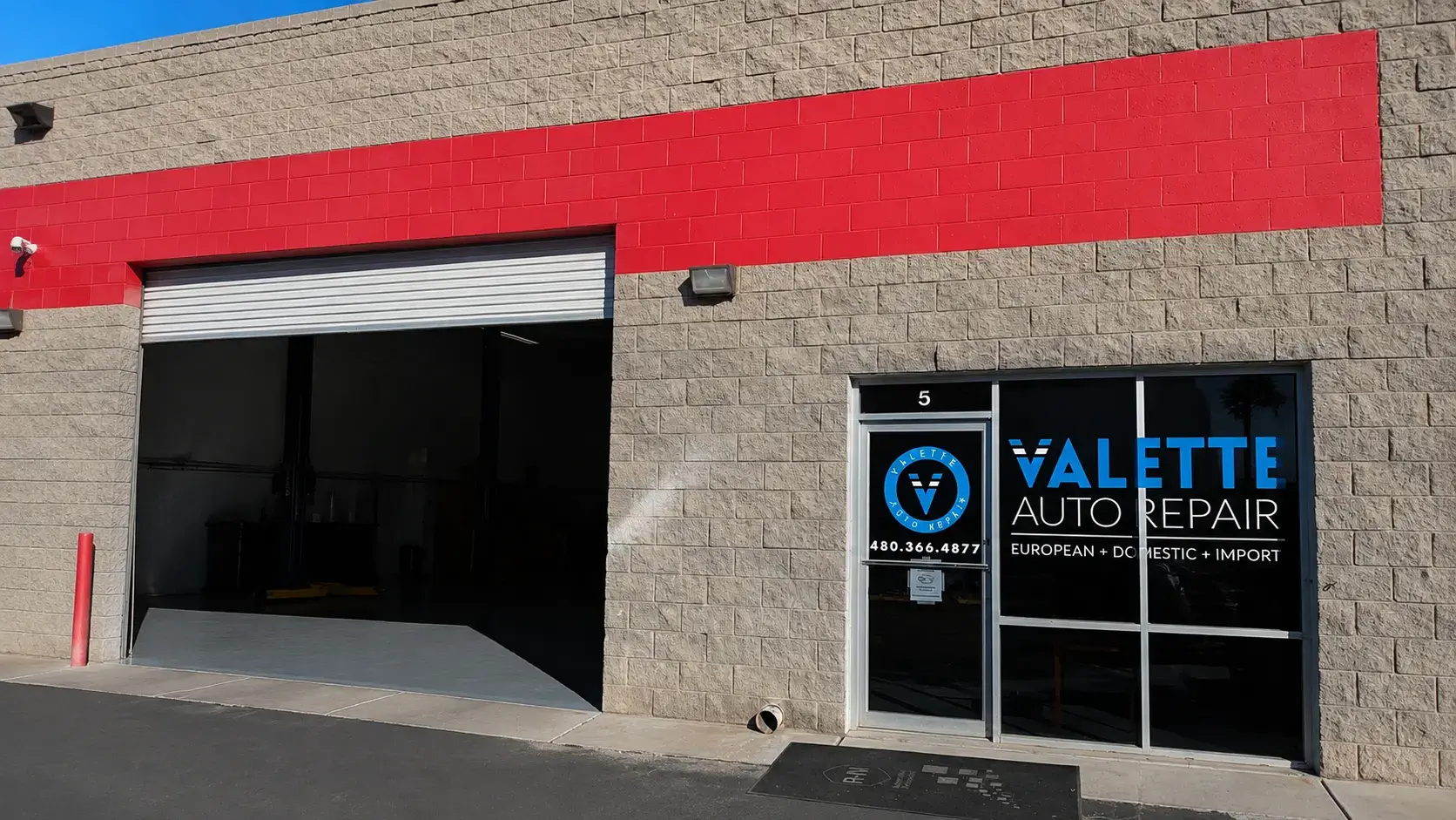 Valette Auto Repair storefront on East Highland Street in Chandler, Arizona with the service bay door open